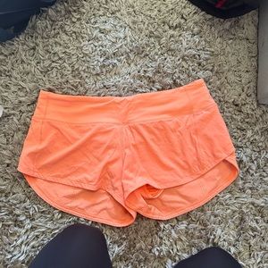 orange speed up shorts
